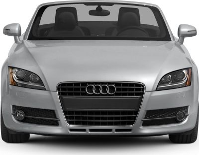 Front view with grille, headlights, fog lights, and side mirrors of a convertible