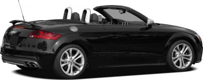 Rear and side view of convertible with dual exhaust and alloy wheels