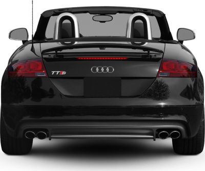 Rear view with dual exhaust, spoiler, and roll bars on a convertible