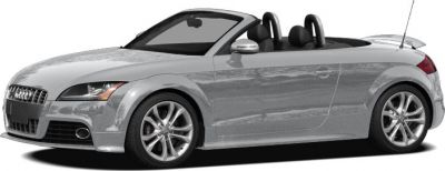 Silver convertible sports car with sleek body and alloy wheels