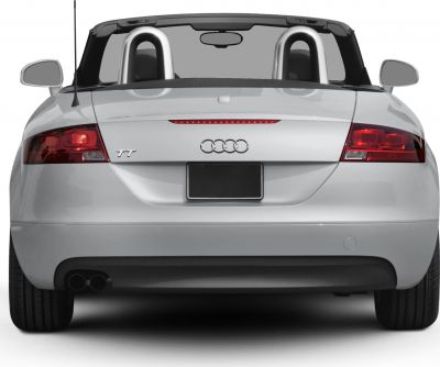 Rear view of convertible with dual exhaust and distinctive tail lights