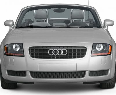 Front view with grille, headlights, and convertible seats