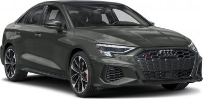 Front view of sedan with black honeycomb grille and LED headlights.