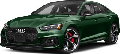 Front side view with black honeycomb grille and stylized alloy wheels.