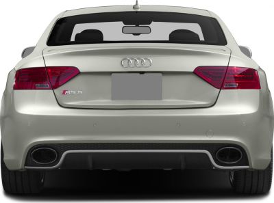 Rear view showing tail lights and dual exhausts on a sports coupe