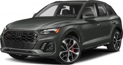 Front black honeycomb grille and sporty alloy wheels with red brake calipers