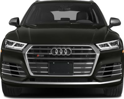 Front grille and LED headlights of a luxury SUV