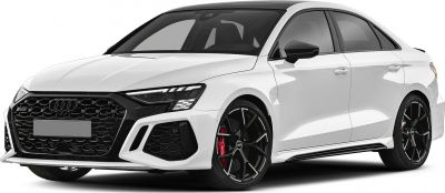 Aggressive front honeycomb grille and black alloy wheels on a sporty sedan