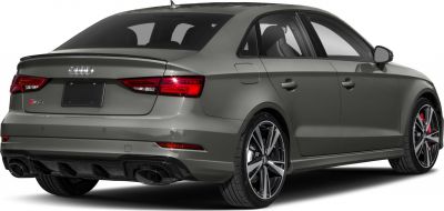 Rear view with sporty alloy wheels and dual exhaust tips
