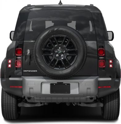 Rear view with spare tire mounted on back door and distinctive taillights