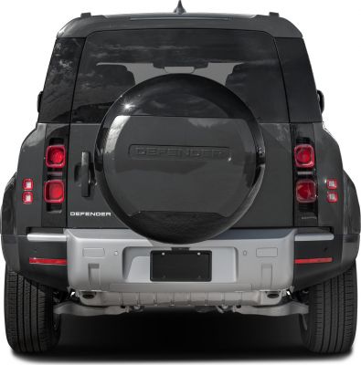 Rear view with prominent spare tire cover and vertically stacked tail lights