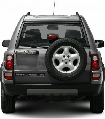 Rear view with spare tire mounted on rear door and tail lights