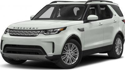 Front grille and side profile of white SUV with alloy wheels and roof rails