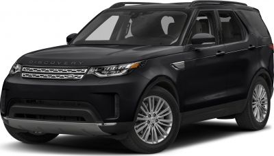 Front side view of a black SUV with modern grille and headlights.