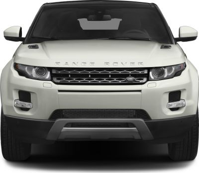 Front view with prominent grill, headlights, and hood design