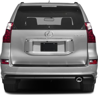 Rear view with taillights, rear window, and exhaust pipe.