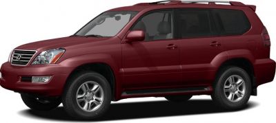 Side profile of a red SUV with alloy wheels