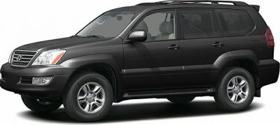 Front side profile of a mid-size luxury SUV with black paint and five-spoke alloy wheels