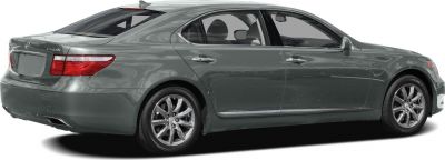 Luxury sedan rear-side profile with alloy wheels and rear lights