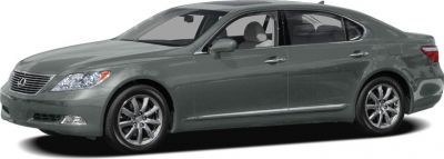 Side view of a luxury sedan with alloy wheels and sleek design.