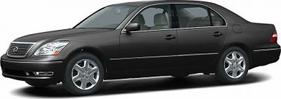 Side profile of a luxury sedan with chrome accents and polished wheels