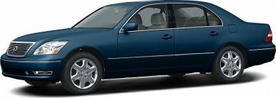 Sleek side profile of a luxury sedan with alloy wheels and chrome trim