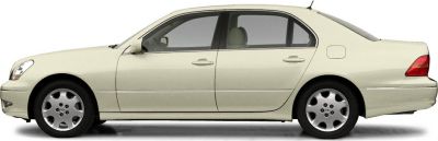 Side view of classic luxury sedan with smooth lines and alloy wheels