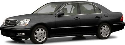Side profile of a black luxury sedan with alloy wheels and chrome trim