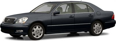 Side profile of a luxury sedan with chrome trim and alloy wheels