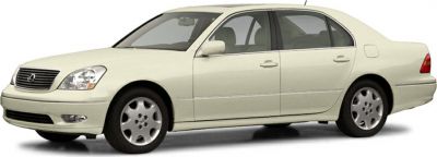 Luxury sedan with chrome grille and alloy wheels