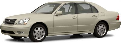 Side profile of a luxury sedan with smooth design and alloy wheels