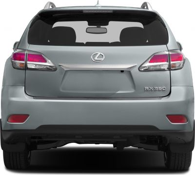 Rear view focusing on LED tail lights and rear window with chrome trim.