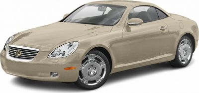 Luxury two-door coupe with smooth curves and distinctive alloy wheels