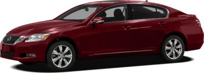 Side profile of a deep red four-door luxury sedan with alloy wheels.