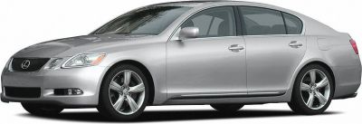 Silver four-door sedan side profile with alloy wheels