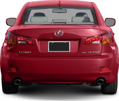 Rear view with tail lights, dual exhaust, and AWD badge