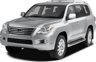 Front and side view of a luxury SUV with bold grille and roof rails