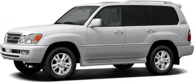 Side profile of a silver SUV with alloy wheels and rugged design