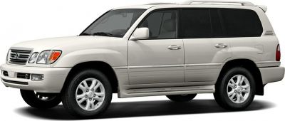 Front side view of luxury SUV with alloy wheels and beige exterior
