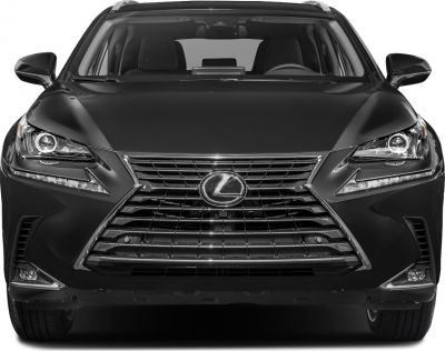 LED headlights and spindle grille of a modern luxury SUV front.