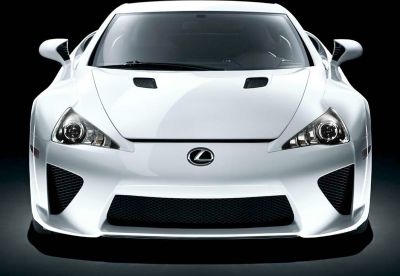 Front view with aggressive grill, aerodynamic vents, and sharp headlights.