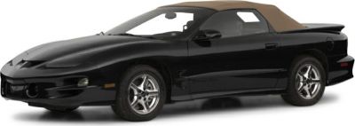 Front side view of black convertible with alloy wheels and soft top roof