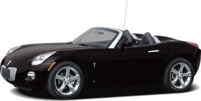 Convertible roadster with chrome 5-spoke wheels and aerodynamic styling
