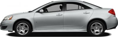 Side profile of silver four-door sedan with alloy wheels