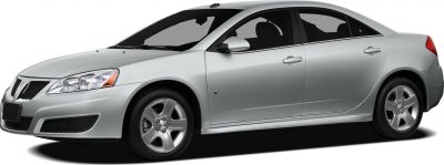 Aerodynamic sedan with five-spoke alloy wheels and sleek body