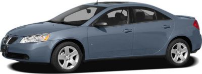 Sleek sedan side profile with smooth lines and alloy wheels