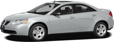 Sleek silver sedan with alloy wheels in side profile view