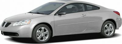 Silver two-door coupe with sleek sporty design