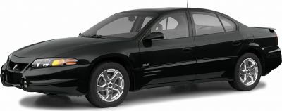 Black sedan with aerodynamic design and alloy wheels