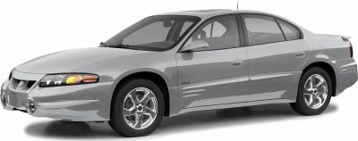 Side view of sedan with alloy wheels and fog lights